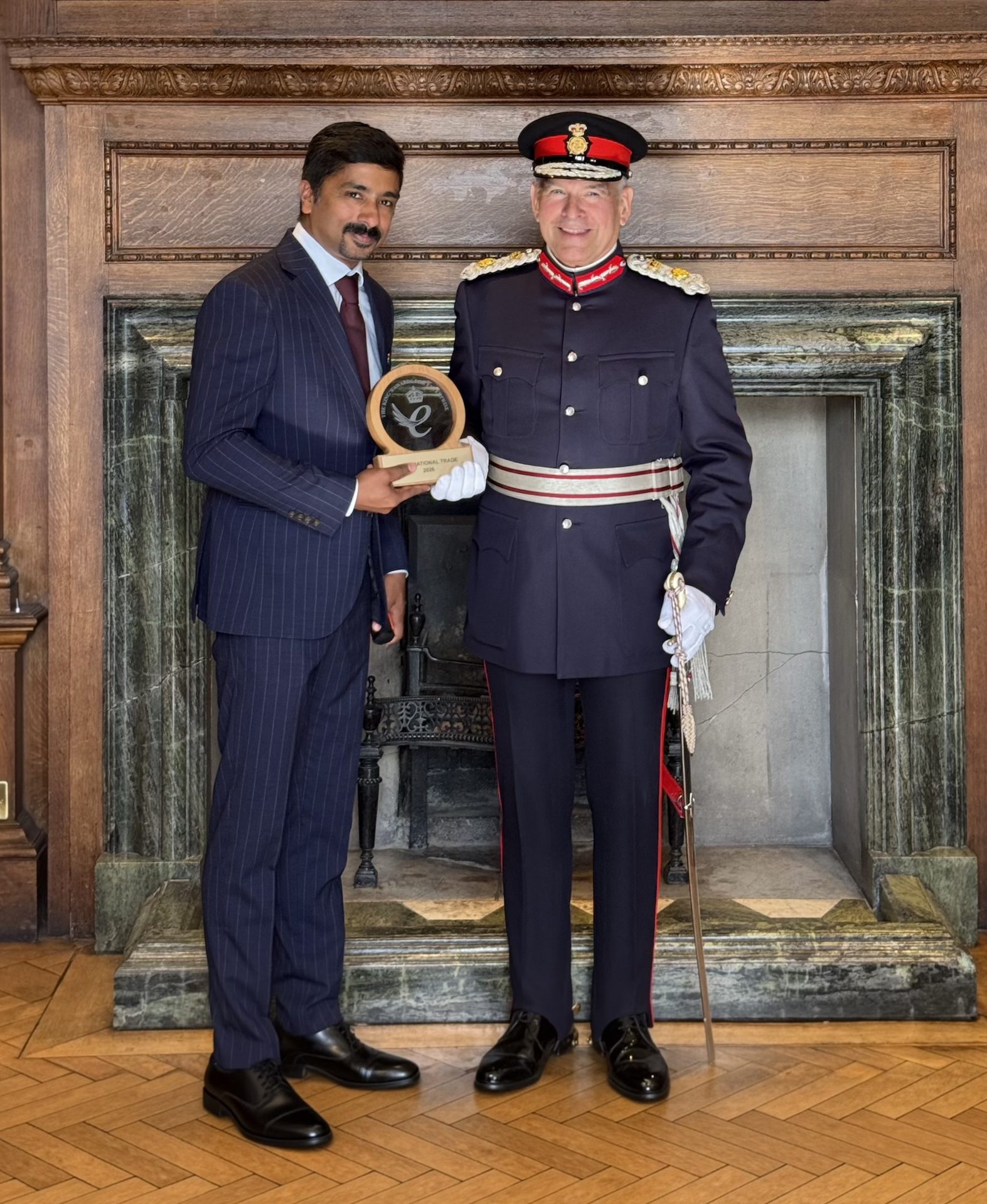 AyataCommerce founder Shine Mathew receiving the King's Award for Enterprise from the Lord-Lieutenant of the Royal County of Berkshire